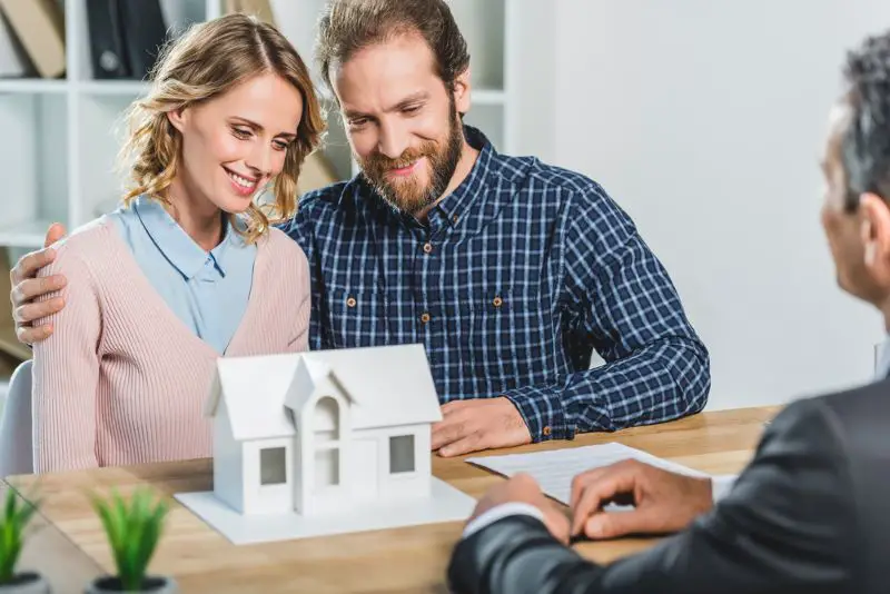 Couple at real estate agency