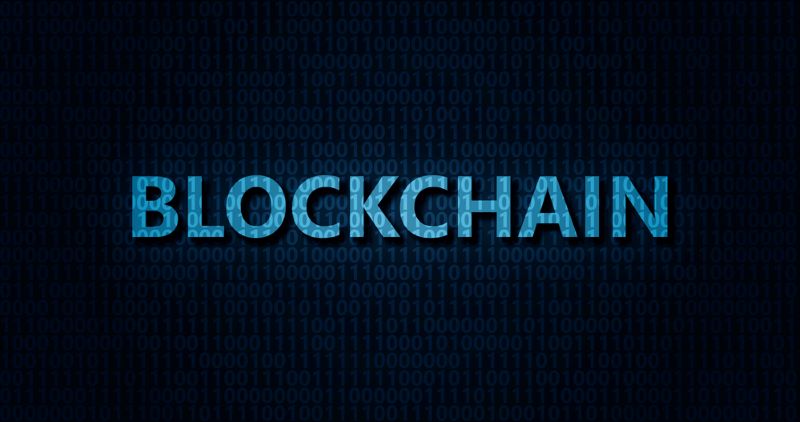 Blockchain word on digital background with binary code