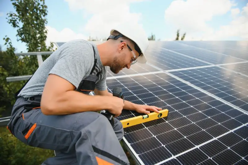 A man working at solar power station