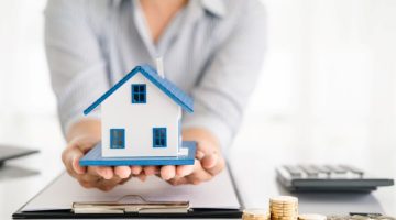 Real estate agent Delivering sample homes to customer