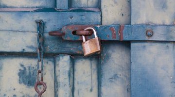 Blue wooden door with padlock
