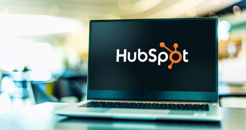 Laptop computer displaying logo of HubSpot
