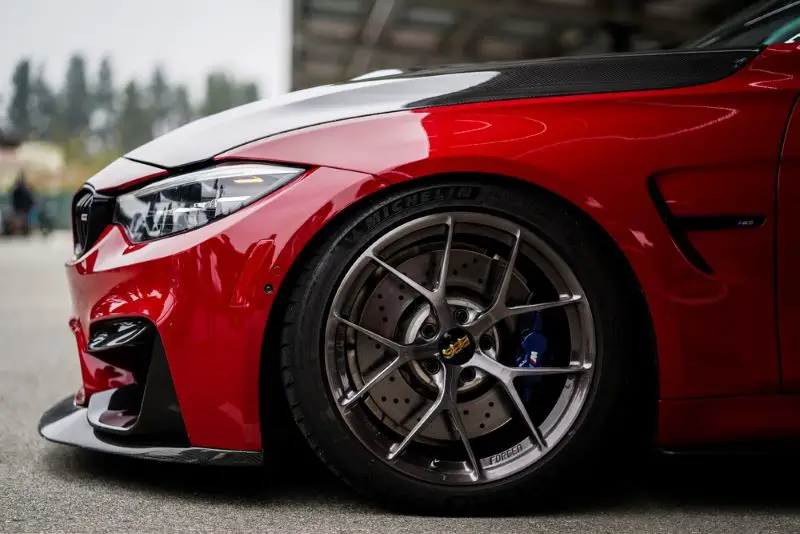 LOS ANGELES, UNITED STATES – Sep 23, 2019: Red modified m3 bmw with carbon fiber details.