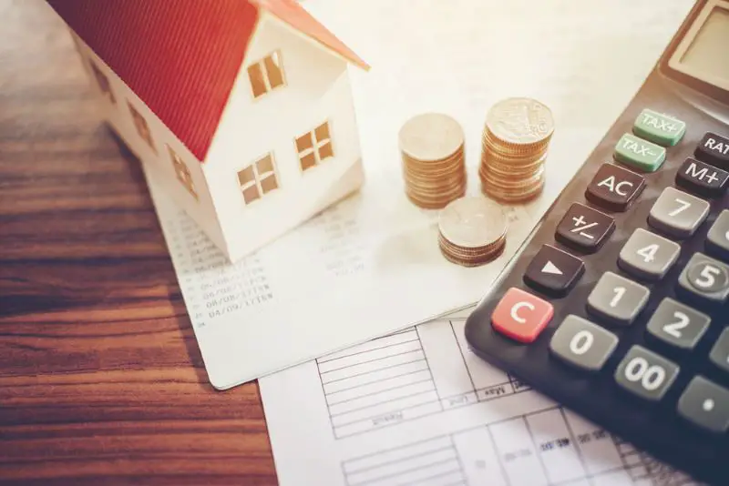 Saving money concept calculator cost for home, estate planning, retirement