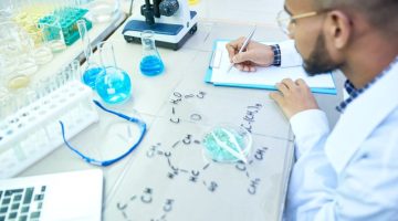 Middle-Eastern Scientist Working in Lab