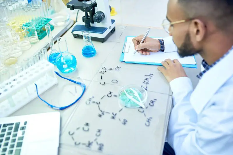 Middle-Eastern Scientist Working in Lab