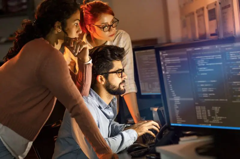 Software Programmers work late at night