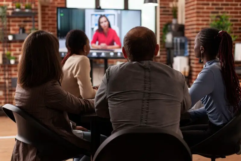 Executives managers people discussing project ideas with remote leader