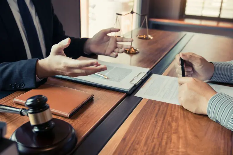 Lawyer explained to the client about the legal issues that must be taken in court in the office.