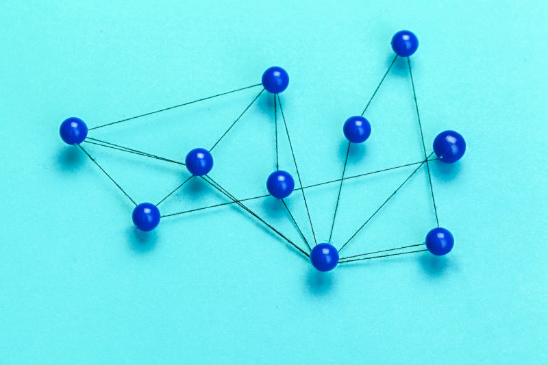 pins connected creating a network- connecting the dots