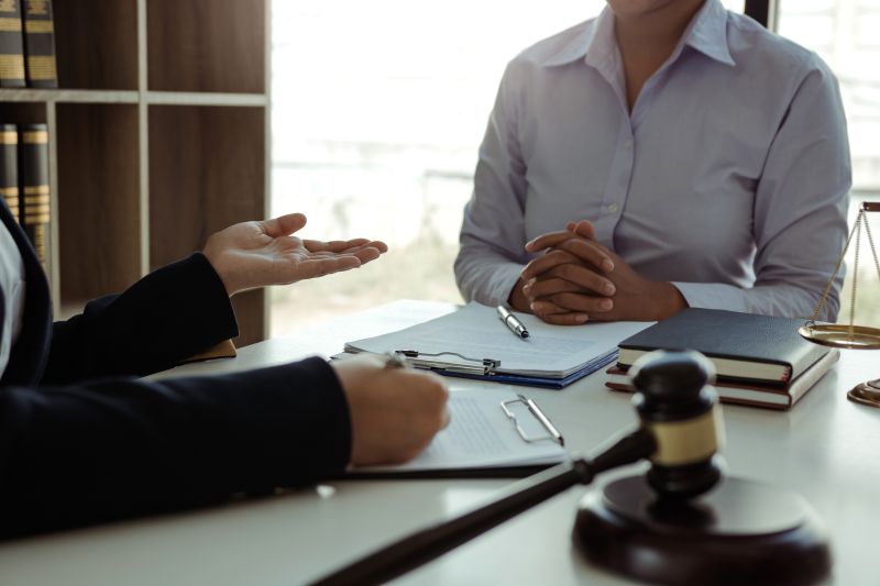 Lawyer is giving advice to clients who have consulted about legal issues