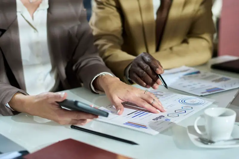 Studying financial data at meeting