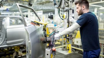 Man working in modern car factory