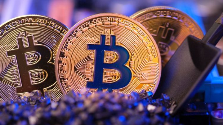 Mining Bitcoin crypto currency on circuit board.virtural money.blockchain technology.mining concept