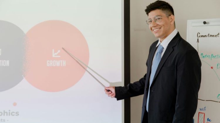 Smiling Businessman Discussing His Presentation