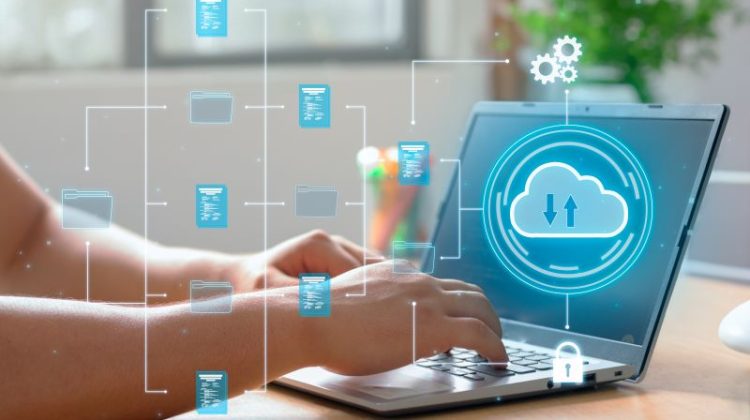 Cloud Computing Concept with a Person Using Laptop