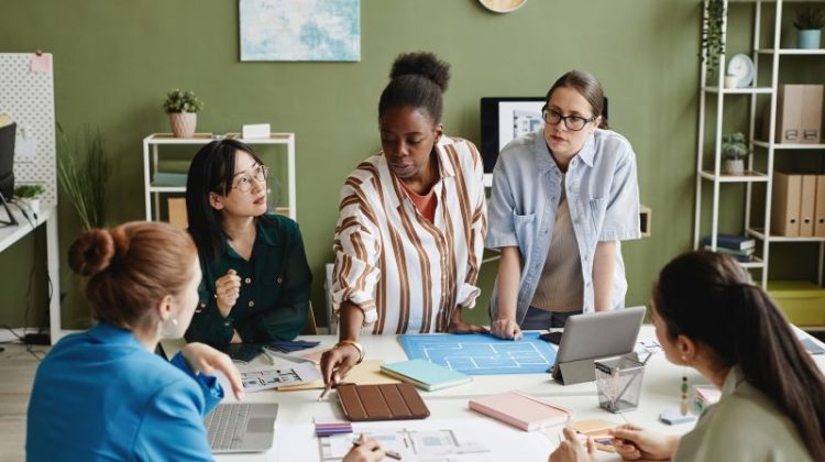 Collaborative Women Planning Project in Modern Office