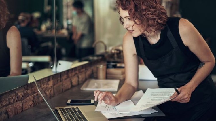 Woman Business Owner Working in Her Shop