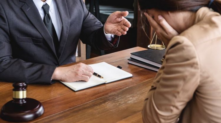 Troubled Woman with Attorney in Office