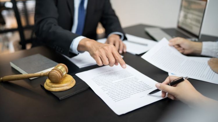 Business Meeting and Signing Legal Documents in Office