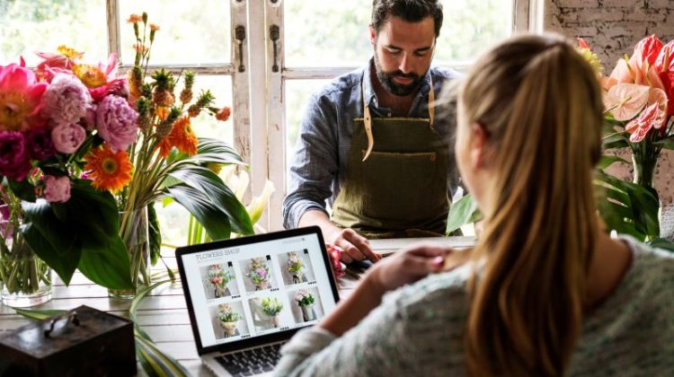 Flower shop business owner working service