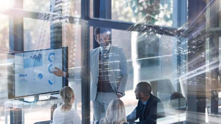 Business Professionals Meeting Analyzing Data in Conference Room