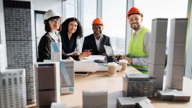 Architects and Engineers Meeting in Modern Office