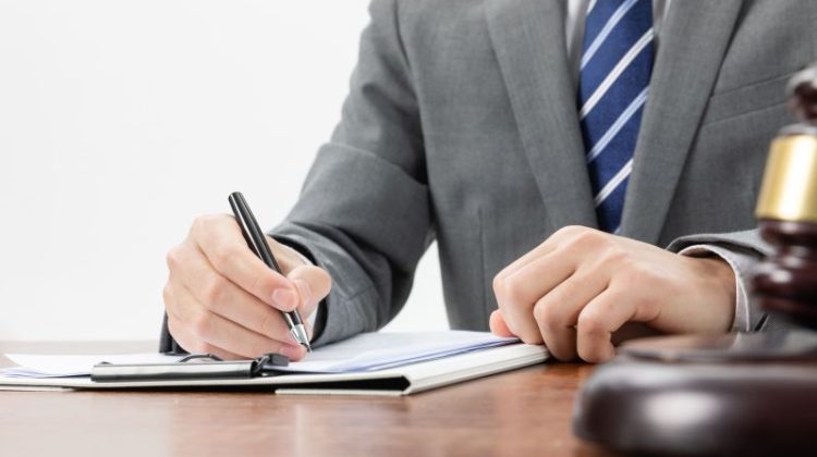 Lawyer at Desk Reviewing Legal Documents