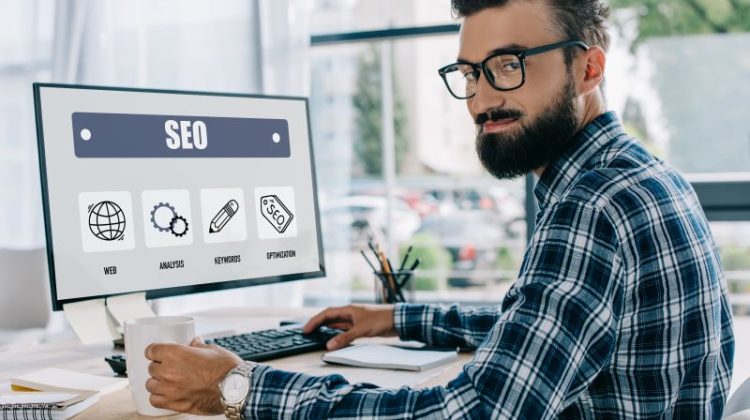 Man Working on SEO at Modern Workspace