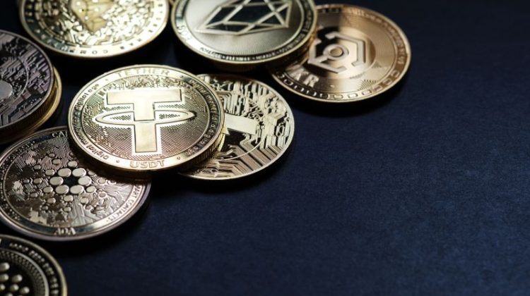 Digital Currency Coins on Black Background Close Up