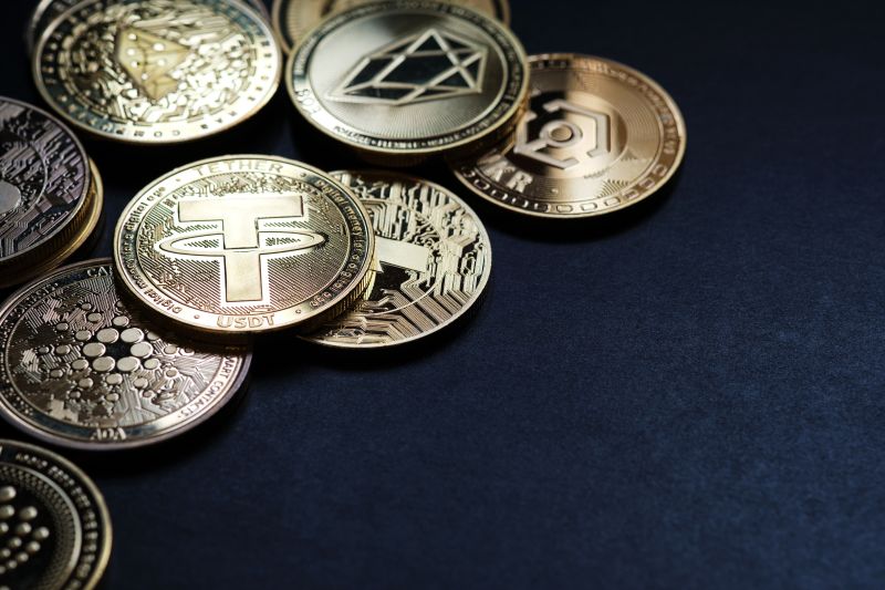 Digital Currency Coins on Black Background Close Up