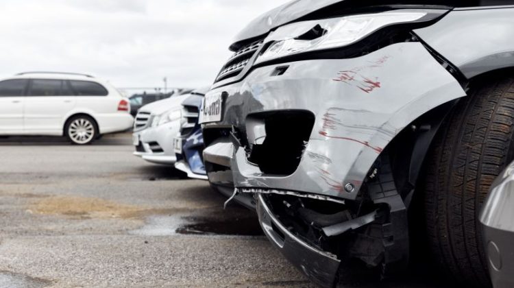 Vandalised Car With Damage To Bodywork In Car Park