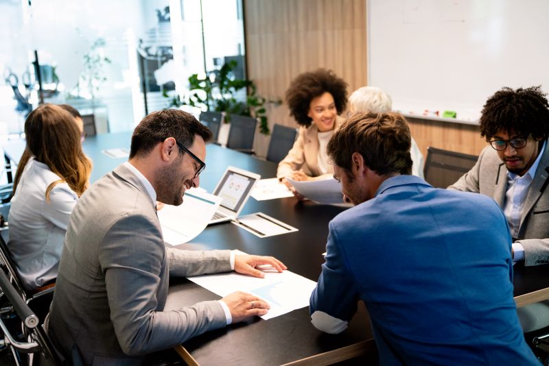 Creative business people working on business project in office