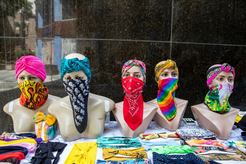 Mannequins With Colorful Silk Mask Are For Sale In Street At Sao Paulo, Brazil