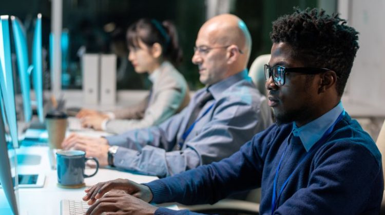 Managed IT professionals providing computer support in a Vancouver business office.