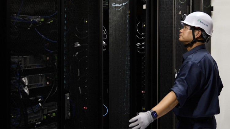 Equans Services technician inspecting server infrastructure as part of integrated facility management operations